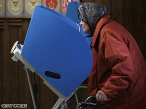 A senior citizen casts her vote in Bloomdale, Ohio.