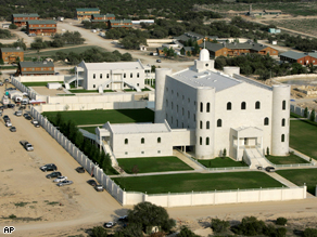 Law enforcement vehicles seen around the main temple on the grounds of the Yearning For Zion Ranch, home of the Fundamentalist Church of Jesus Christ of Latter Day Saints in Eldorado, Texas