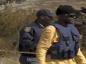 South African police set up cordon as victim lay dying