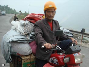 Wang is driving back home to an uncertain future.