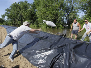 Sandbaggers in Gulfport, Illinios on Monday.