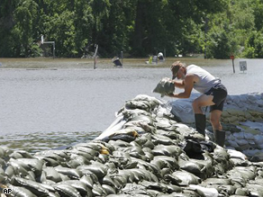 Working on securing the levee along the Mississippi River in Clarksville, Mo., Tuesday.