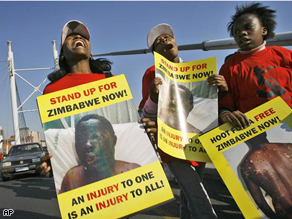 Zimbabweans and South Africans demonstrate against election related violence in Zimbabwe on Nelson Mandela Bridge in downtown Johannesburg, South Africa