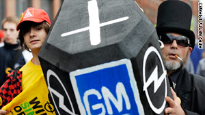 Opel workers demonstrate with a mock coffin at Opel's main plant in Ruesselsheim, western Germany.