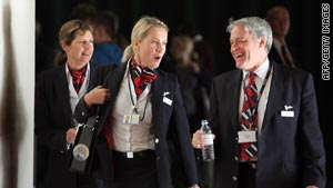 British Airways cabin crew attend a union meeting to discuss possible strike action.