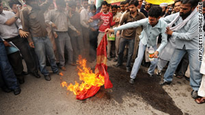 Demonstrators angry at cartoons in a Danish newspaper burn the Danish flag in Pakistan last year.