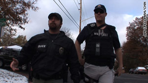 Parole Officer Dean Warren, left, and Deputy U.S. Marshal Erick Helsing go after sex offenders.