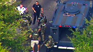 Emergency personnel arrive on the scene of Friday's shooting in Orlando, Florida.