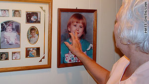 Eugenia Willingham shows photographs of her lost grandchildren and the stepson who was executed.