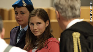 American student Amanda Knox looks at one of her lawyers before trial events Saturday in Perugia, Italy.