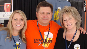Rick Lyke with daughter Brhea (left) and wife Sandy (right).
