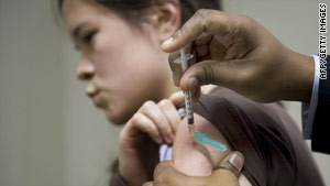 Officials are urging college students to get vaccinated for the H1N1 flu before heading home for the holidays.