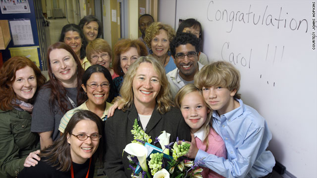 Dr. Carol Greider, center, was feted by her son, daughter and her colleagues at Johns Hopkins School of Medicine on October 5, the day it was announced that she won the Nobel Prize for Medicine.