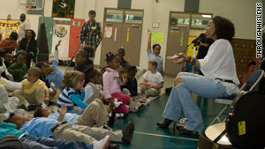 Palmer performs for students in an after-school program in Atlanta. (Photo: Sean Wright for Threshing Floor Academy)
