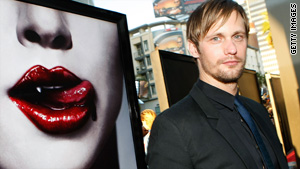 Actor Alexander Skarsgard has a taste for female necks in the vampire TV show "True Blood."