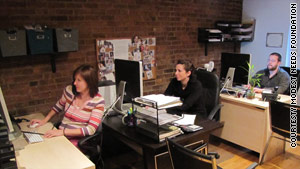 Staffers Fawn Volkert, Jennifer Elfar and Forrest Mason work on cases at Modest Needs' New York office.