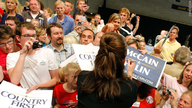 Sarah Palin signs autographs during the McCain-Palin campaign of 2008.