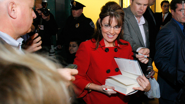 Sarah Palin signs her book "Going Rogue" at a bookstore in Grand Rapids, Michigan.