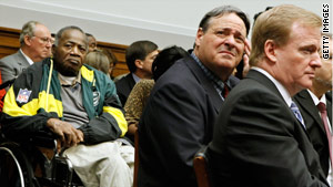 From left, former players Willie Woods and Brent Boyd and NFL Commissioner Roger Goodell at Wednesday's hearing.