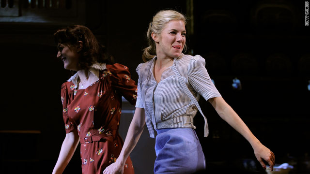 Sienna Miller leaves the stage following a curtain call on the opening night of "After Miss Julie" on Broadway.