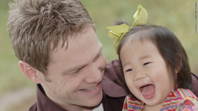 Steven Curtis Chapman sits with his daughter Maria. She died when accidentally struck in his family's driveway.