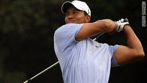 Woods carded a second successive five-under-par 67 to share the halfway lead in Shanghai.