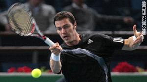 Marat Safin's career continues for at least one more match after his opening round victory in Paris.