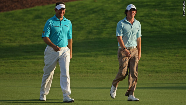 Lee Westwood, left, and Rory McIlroy, right, are battling to win the Race To Dubai title.