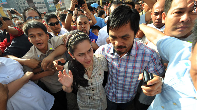 manny pacquiao wife. Manny Pacquiao returns home to