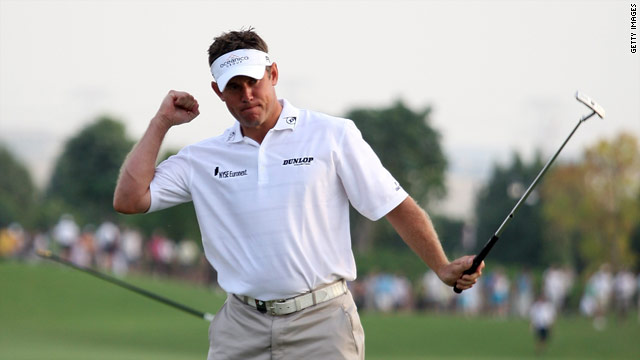 Westwood is delighted after rolling home his birdie putt on the final hole at the Earth Course.