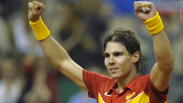 Rafael Nadal celebrates his opening victory over Tomas Berdych in the Davis Cup final.
