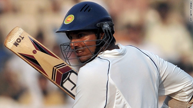 Skipper Kumar Sangakkara delayed a seemingly inevitable defeat with his 21st Test century for Sri Lanka.