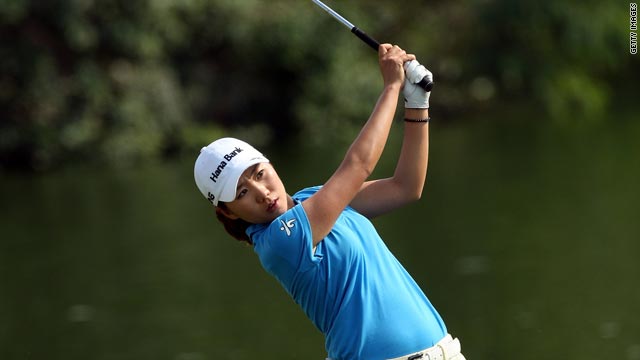 In-Kyung Kim plays her second shot at the ninth hole on the Majilis Course at the Emirates Golf Club.