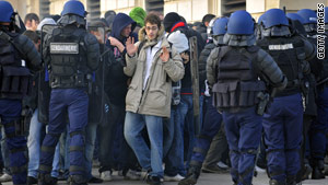 French police try to restore order as Marseille and PSG fans clash.