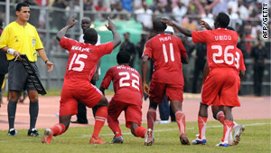 Heartland players celebrate their late winner against Mazembe in the African Champions League final first leg.