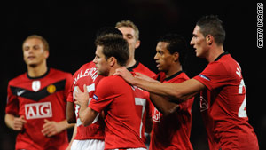 United players celebrate Valencia's late equalizer at Old Trafford.