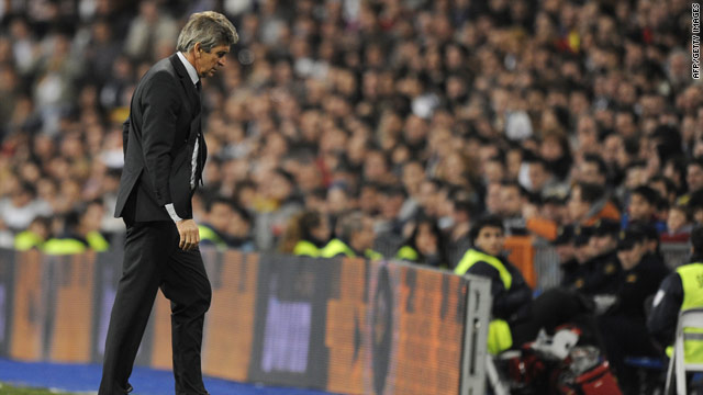 Real Madrid coach Manuel Pellegrini cut a lonely figure after his side's early exit in the Copa Del Rey.