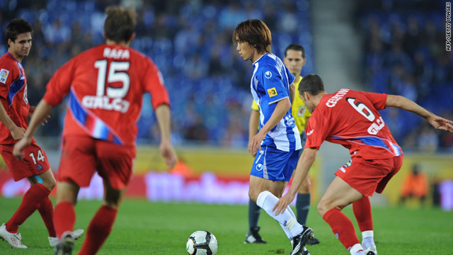 Shunsuke Nakamura of Espanyol is surrounded by Getafe players during their Spanish Cup match.