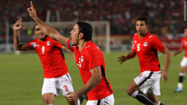 Egypt striker Amr Zaki celebrates after opening the scoring in the second minute of his side's dramatic 2-0 victory over Algeria.