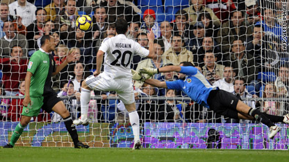 Football: Real on top as Barca falter