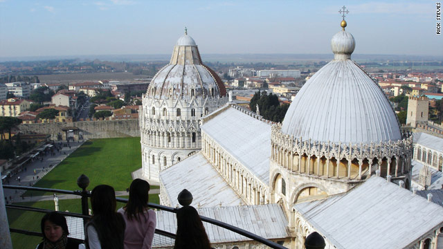 Climb the Leaning Tower's 294 steps for a breathtaking view of Pisa's cathedral, baptistery, and beyond.