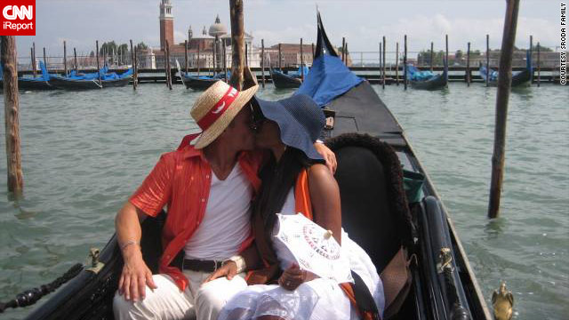 Mikolaj Sroda and his wife Loverly Jn Paul share a romantic moment in Venice, Italy. The couple met while traveling.