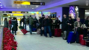 Passengers stranded at LaGuardia airport in New York on Monday.