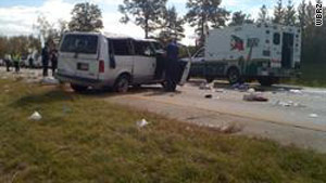Rescue workers at the scene of a multiple-fatality crash Saturday on I-10 near Baton Rouge, Louisiana.