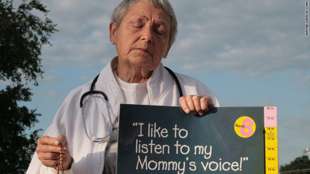 This abortion demonstrator protests a clinic in Nebraska. Today, there's an abortion battle in Oklahoma.