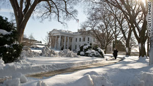The White House basks under a blanket of picturesque white snow on Sunday.