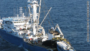 The Alakrana is escorted to safety by Spanish warships on November 17 after being held for 47 days.
