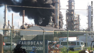 Smoke billows from the fuel depot fire near San Juan, Puerto Rico, on Sunday morning.