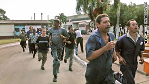 A combat alarm sends Cuban workers to their positions in 2004, the last time such a large military exercise took place.