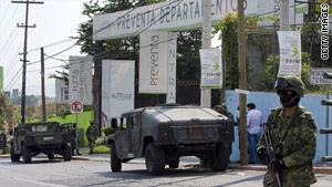 Members of the Mexican navy last week guard the complex where Arturo Beltran Leyva was killed.